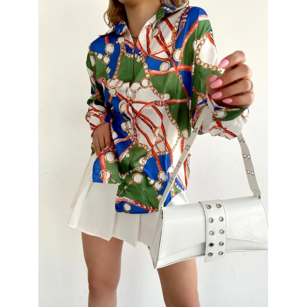 women's silk shirt printed with a pattern of colors, shapes and chains