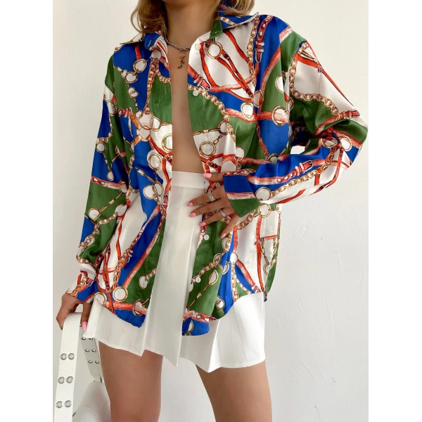 women's silk shirt printed with a pattern of colors, shapes and chains