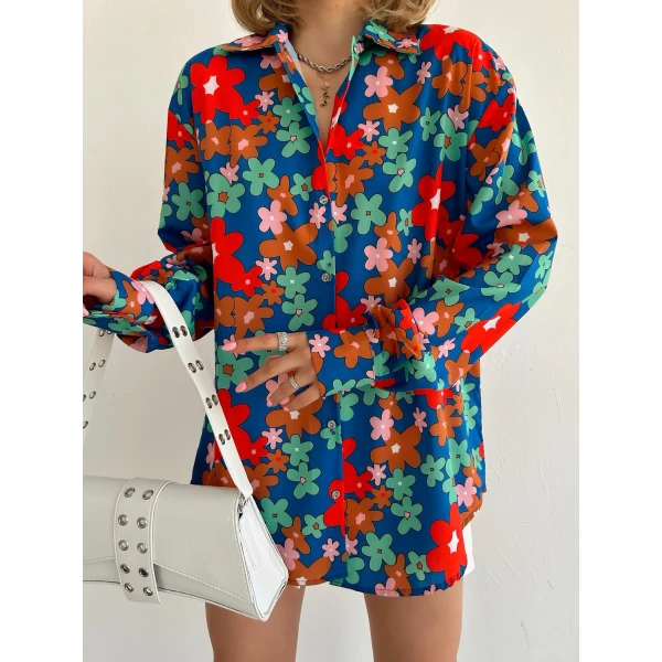 women's silk shirt printed with a pattern of colors, shapes and chains