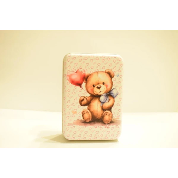 teddy bear and heart-printed metal box
